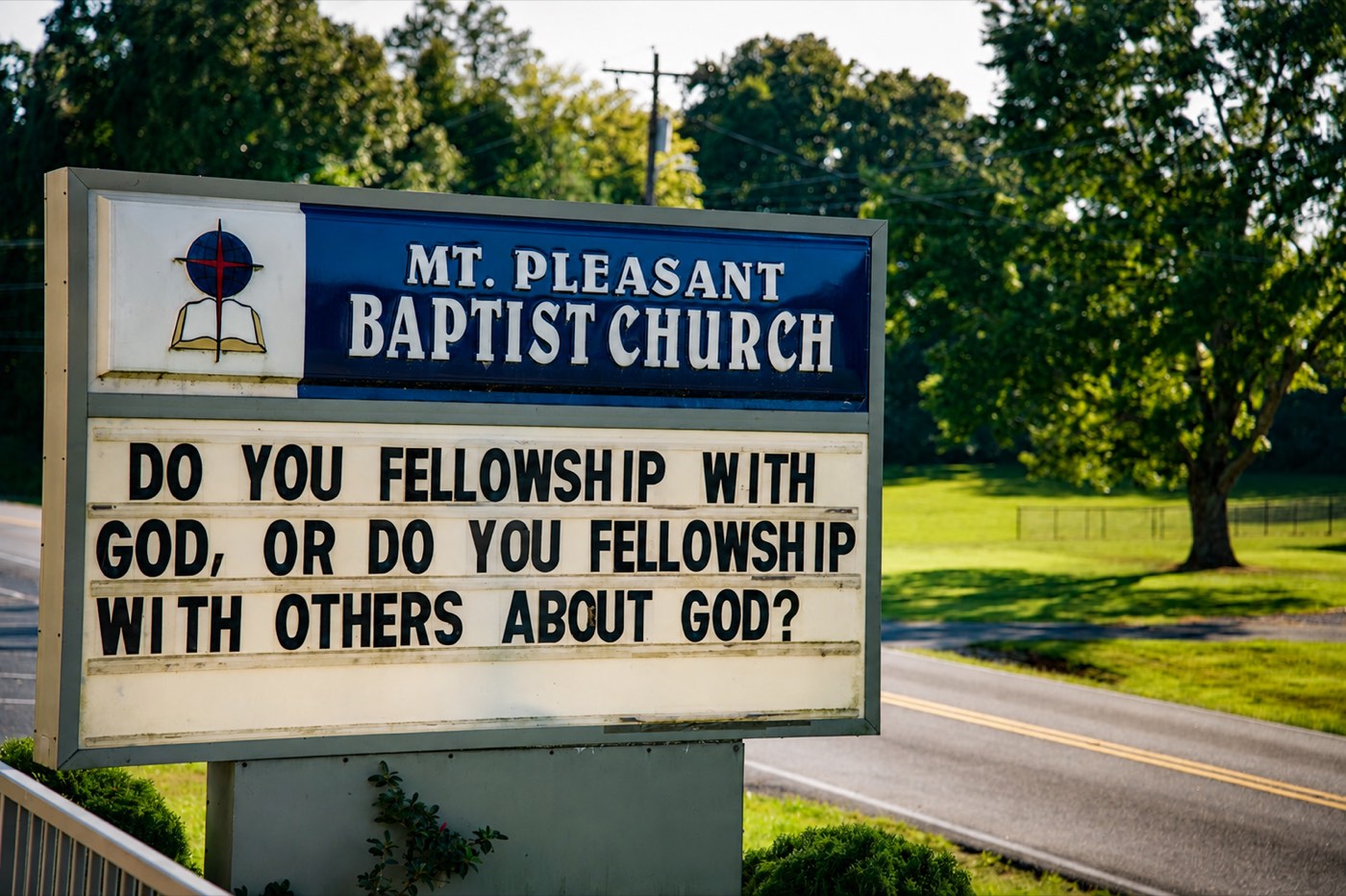 The Mt. Pleasant sign on County Road 71, reading “Do you fellowship with God, or do you fellowship with others about God?”